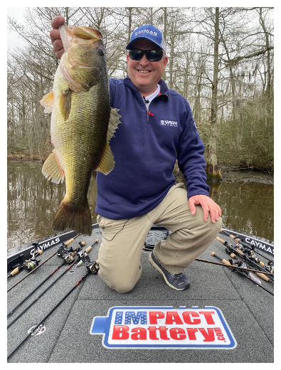 Dustin of Catching Bass Holding a Large Mouth Bass
